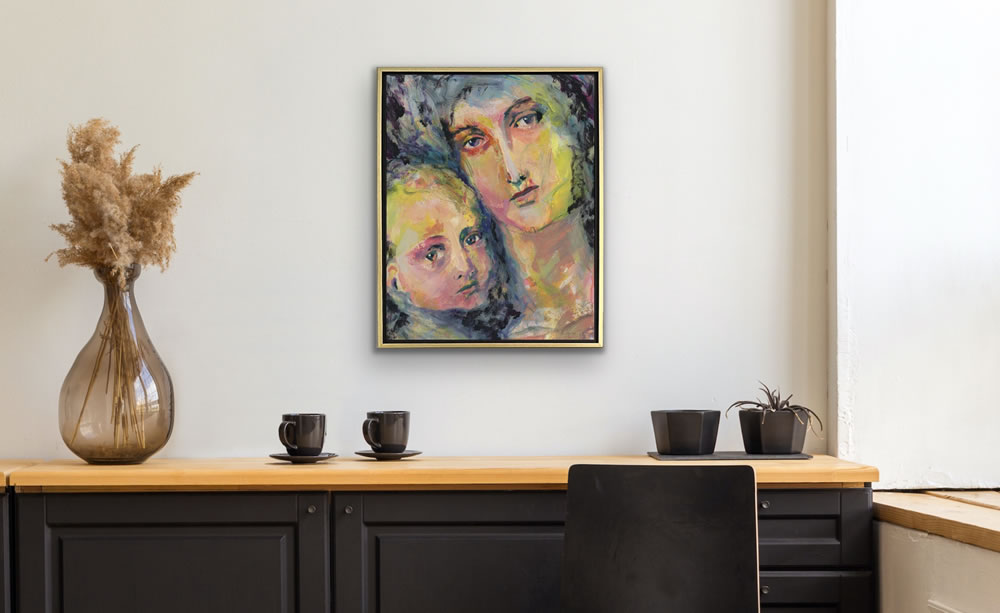 a painting of the mother of jesus shown on a wall above a table with a vase and cups