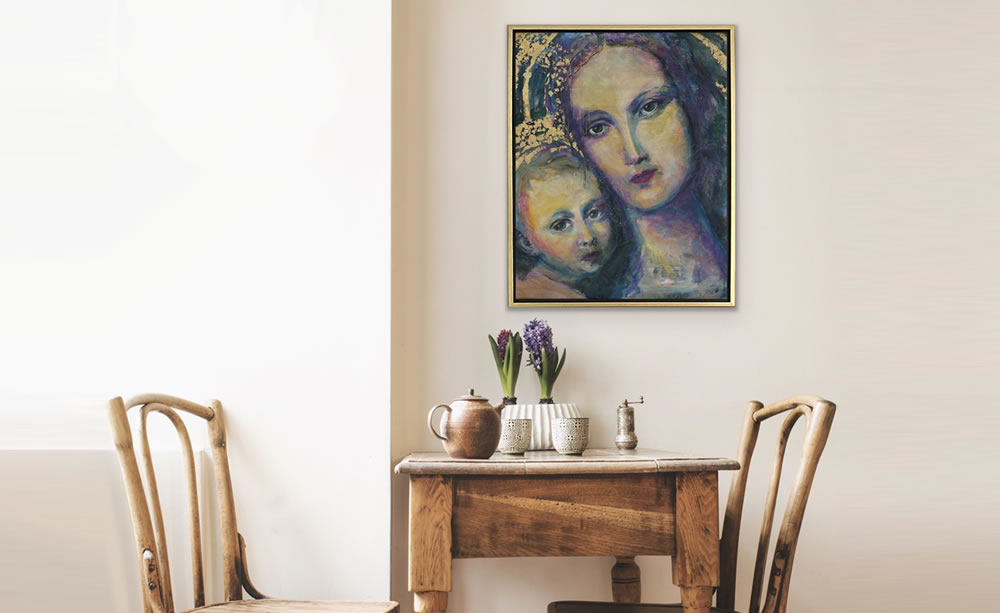 painting of mary, mother of christ hanging on wall above table with flowers, teapot and cups