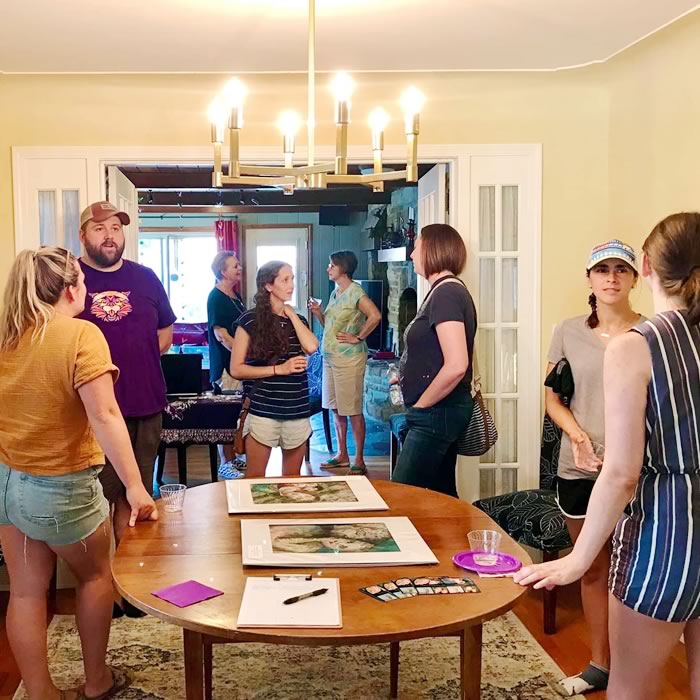 People enjoying Kat's open studio art sale