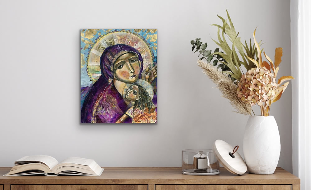 jesus with mary painting on wall above table with plants and books